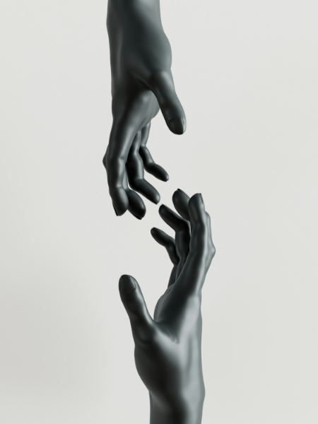 Two artificial hands barely touching each other